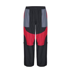 1222970-60-0-83-broek-umbro-zip-of-l-fit-black-red-dahila-iron